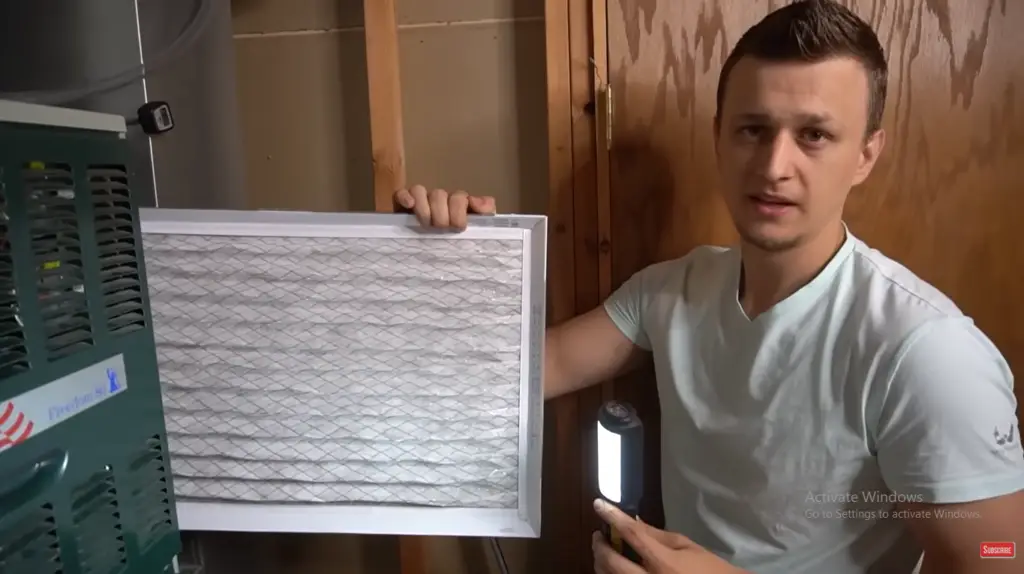 Black mold forming inside a wall-mounted mini split AC unit