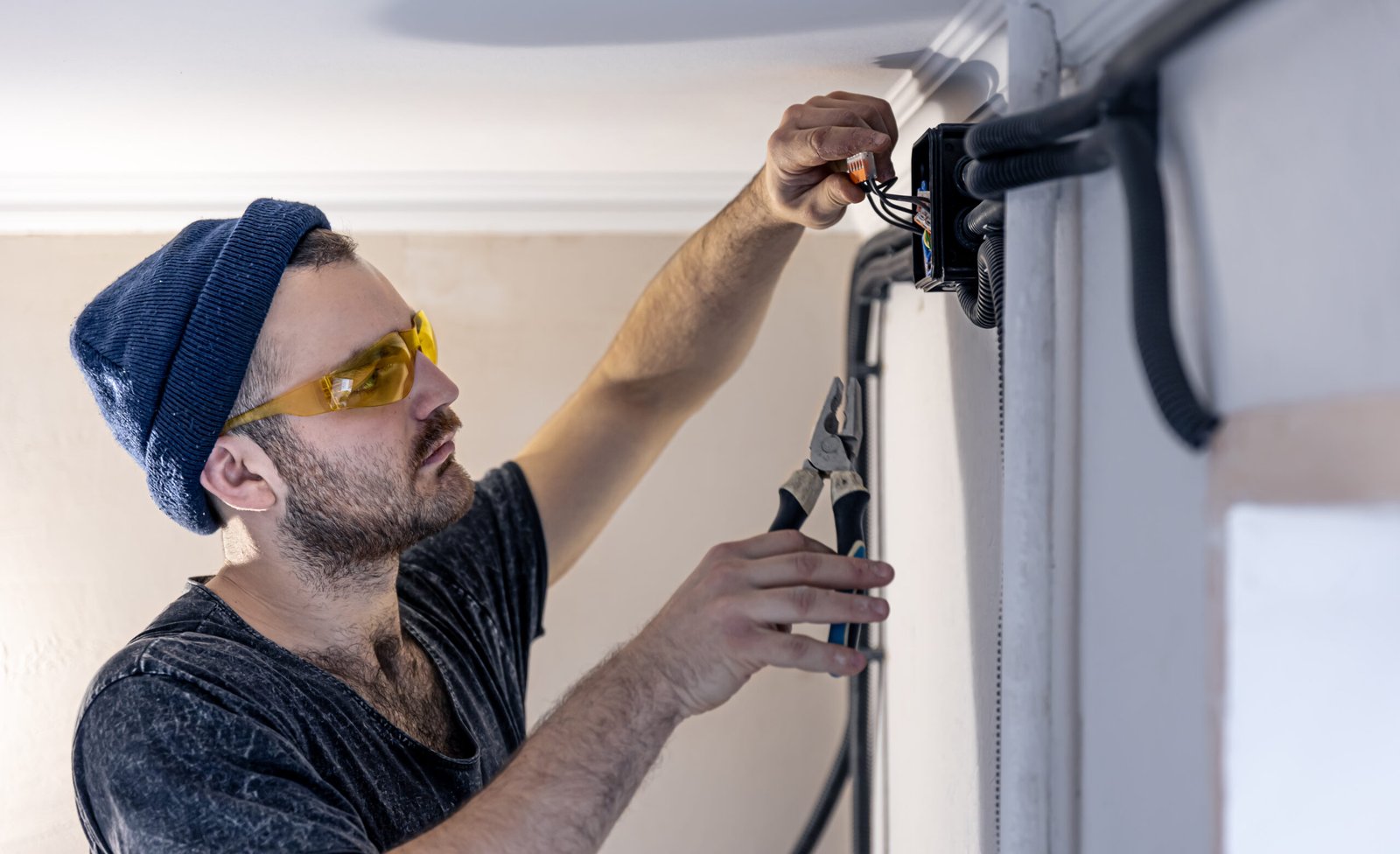 Technician checking furnace system during routine tune-up