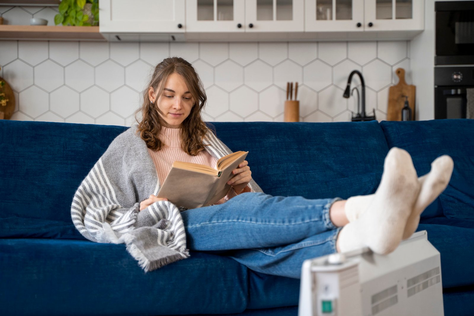 HVAC technician installing whole-home air purification system